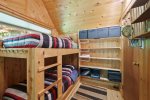 Inviting bunkbeds are a part of another upstairs bedroom.